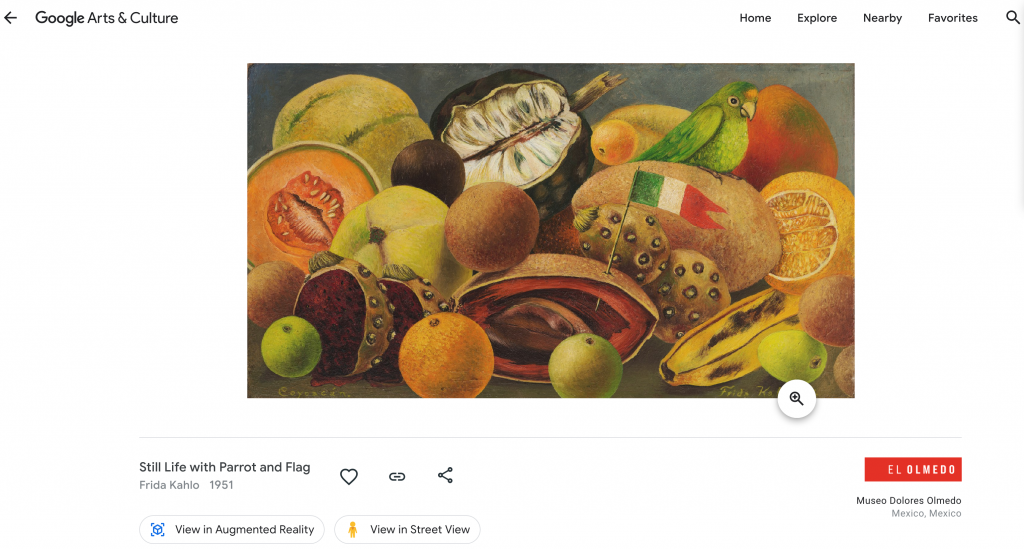 Image depicts a painting of various citrus fruits with a green parrot and a small Mexican flag sticking out from the fruit. Painting is shown through Google Arts and Culture
