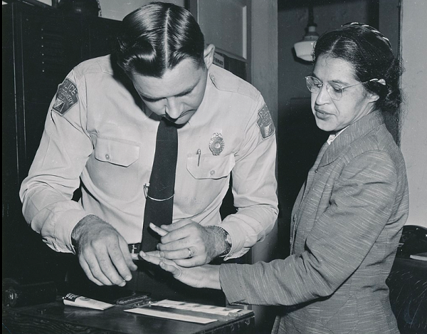 Rosa Parks being fingerprinted