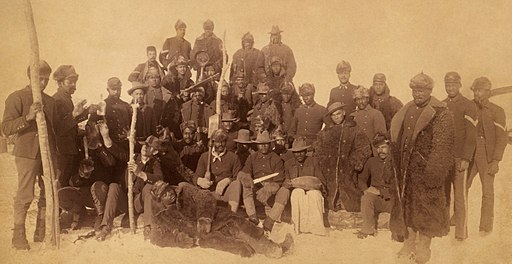 Buffalo soldiers of the 25th Infantry, some wearing buffalo robes, Ft. Keogh, Montana