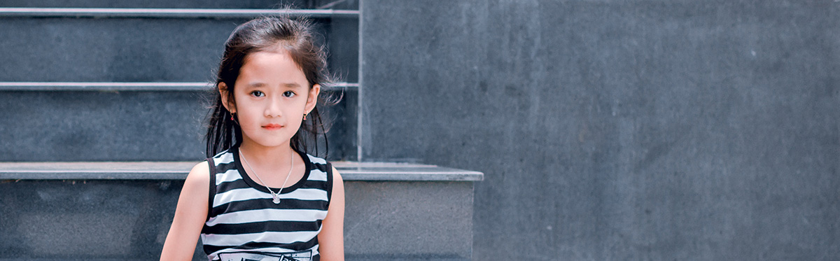A girl sitting on stairs