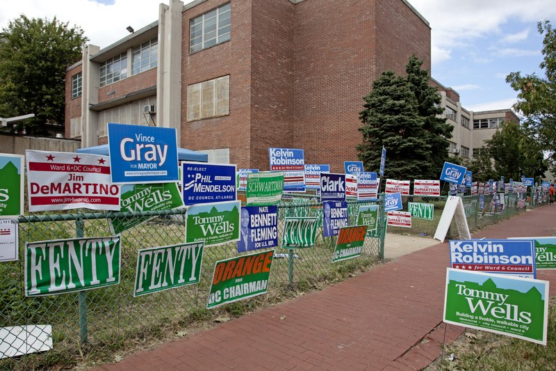 Political campaign posters at the Hine Junior High School, 8th St. near intersection with D St., SE, Washington, D.C