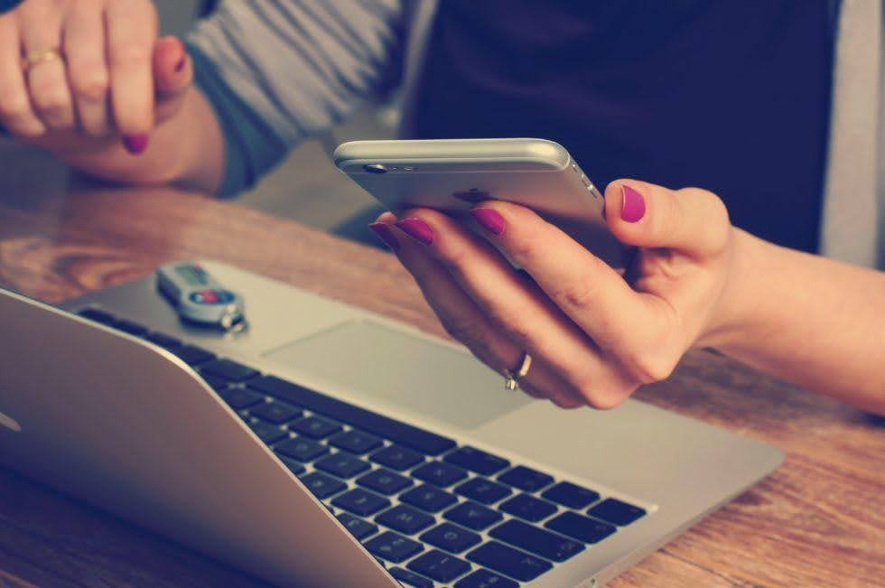 A woman holding a cellphone